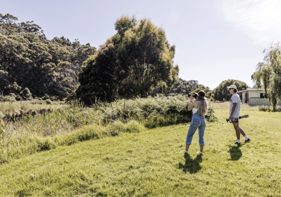 Couple enjoying the bird and wildlife on the Kennett River Nature Walk.